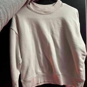 cream colored cropped crewneck size medium